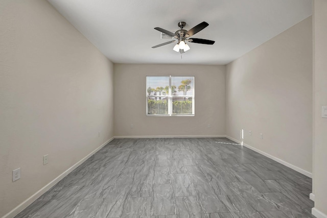 unfurnished room with ceiling fan