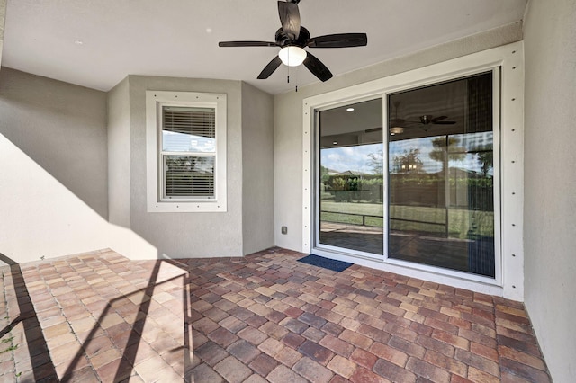 view of patio with ceiling fan