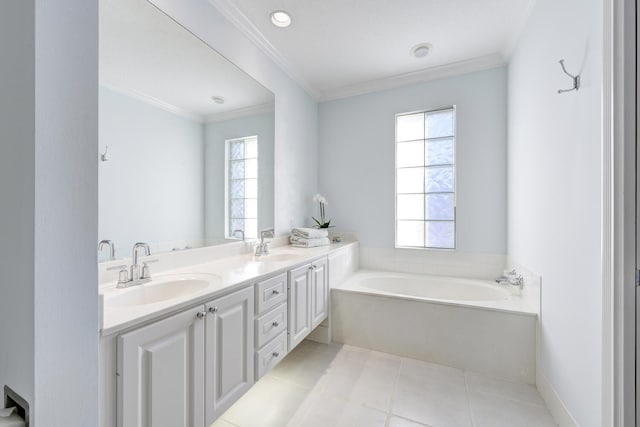 bathroom with vanity, tile patterned floors, a healthy amount of sunlight, and a bathing tub