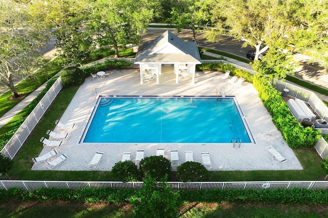 view of pool featuring a patio and an outdoor structure