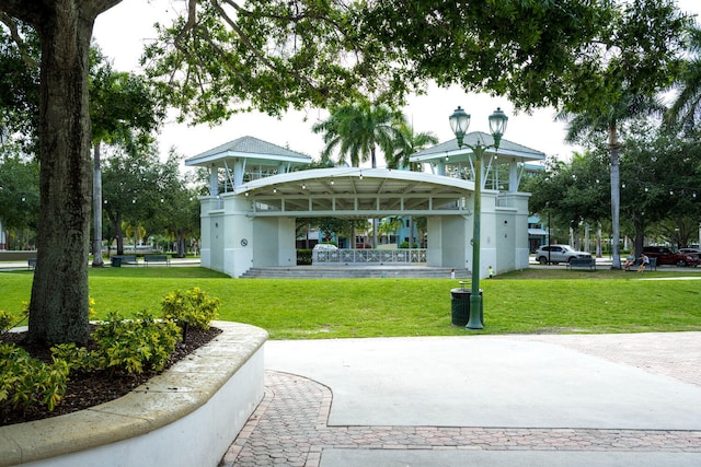 surrounding community featuring a lawn and a gazebo