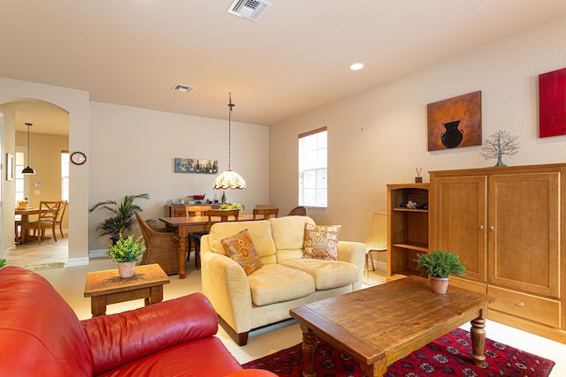 living room with light colored carpet