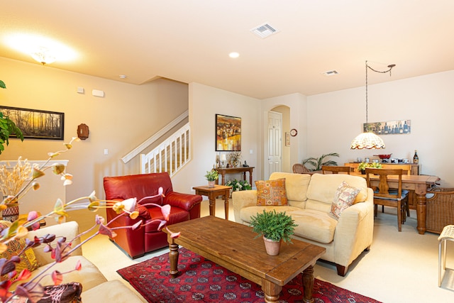 living room with light colored carpet