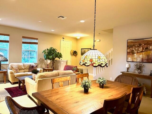 dining area featuring carpet floors