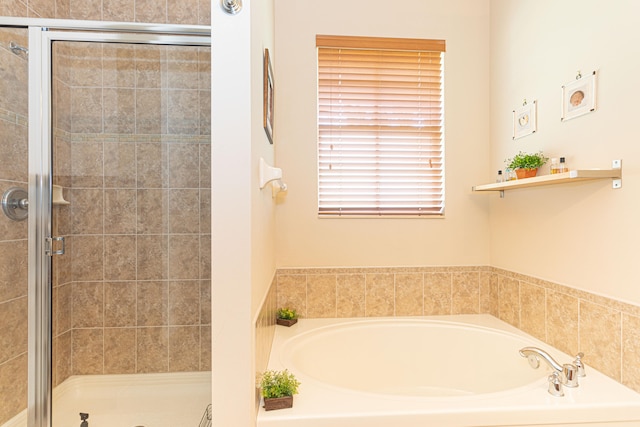 bathroom with independent shower and bath