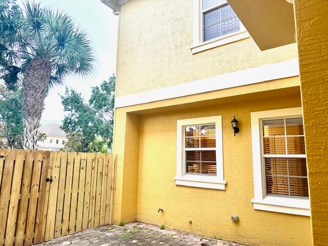 view of property exterior featuring a patio area