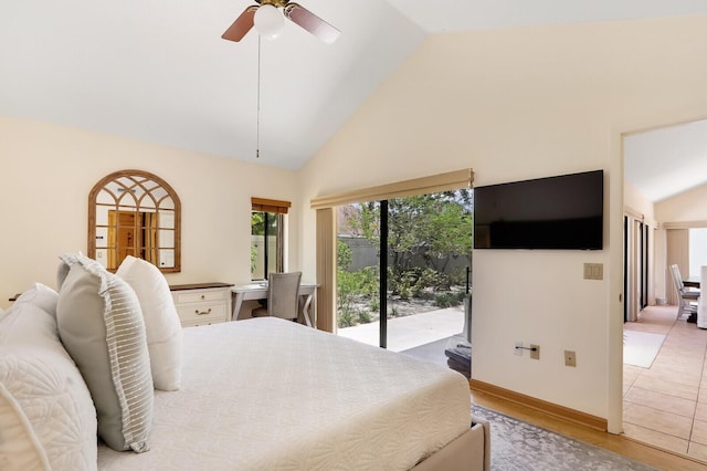 bedroom with ceiling fan, access to exterior, light wood-type flooring, and high vaulted ceiling