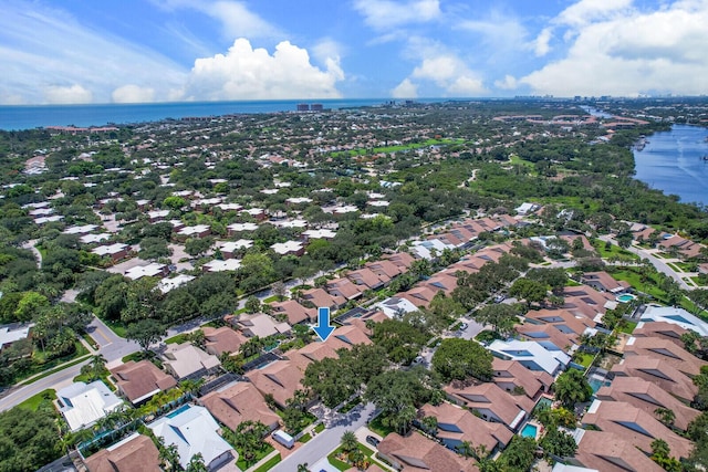 drone / aerial view with a water view