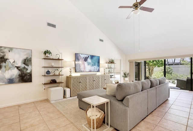 living room featuring ceiling fan, high vaulted ceiling, and light tile patterned floors