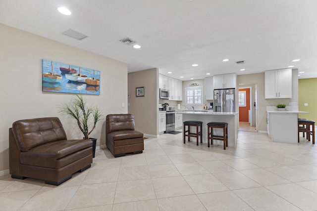 living room featuring light tile patterned floors