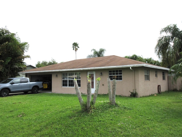 ranch-style home with a front yard