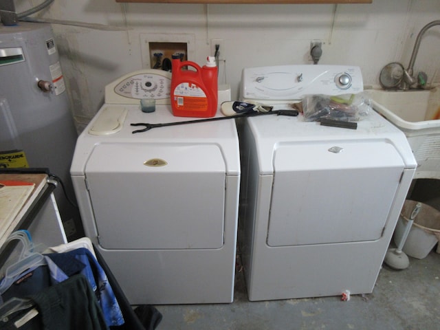 laundry area featuring independent washer and dryer and electric water heater