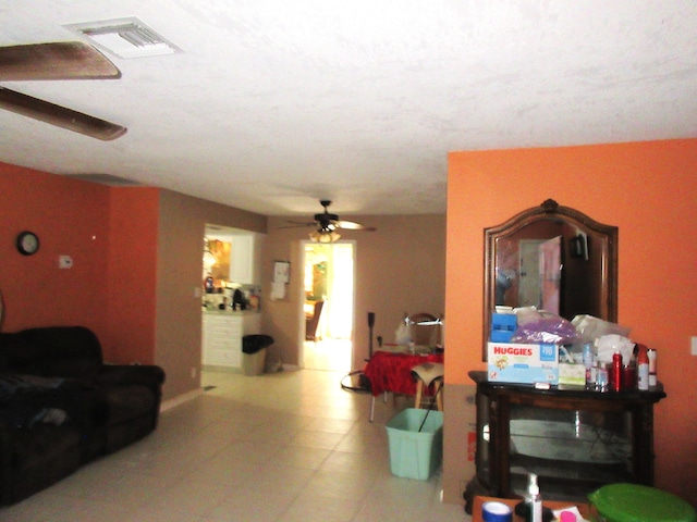 living room with ceiling fan