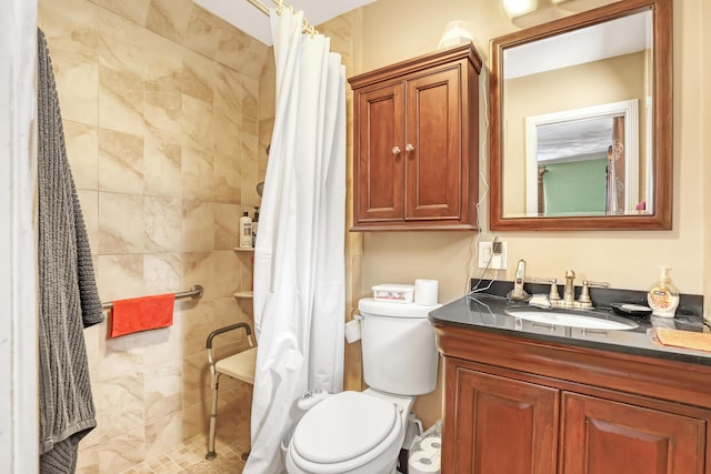 bathroom with vanity, toilet, and a shower with shower curtain