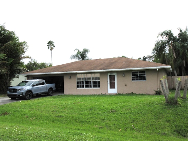 ranch-style home with a front lawn