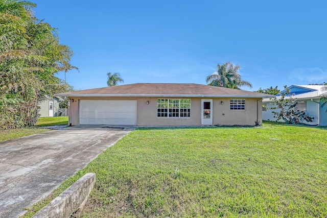 ranch-style home with a garage and a front lawn