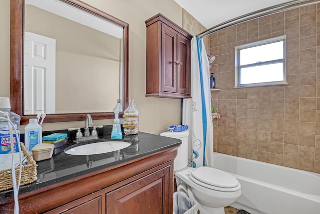 full bathroom with shower / bathtub combination with curtain, vanity, and toilet