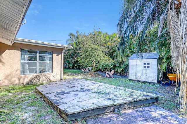 exterior space featuring a shed