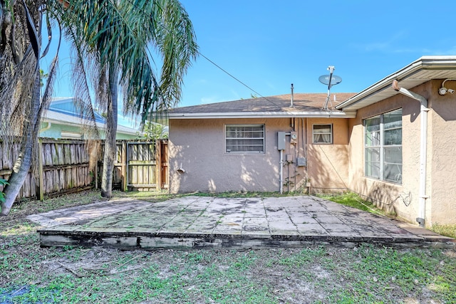 rear view of house featuring a patio