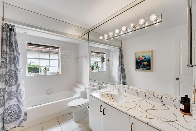 tiled bedroom with multiple windows, a textured ceiling, vaulted ceiling, and ceiling fan