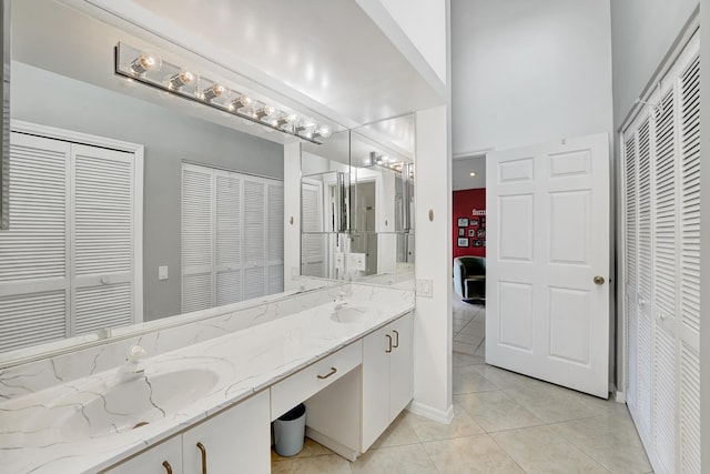 bathroom featuring tile patterned floors and vanity