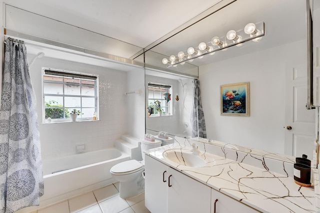 full bathroom featuring tile patterned flooring, vanity, toilet, and shower / bath combo