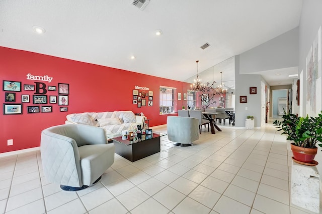 tiled living room with high vaulted ceiling and a chandelier