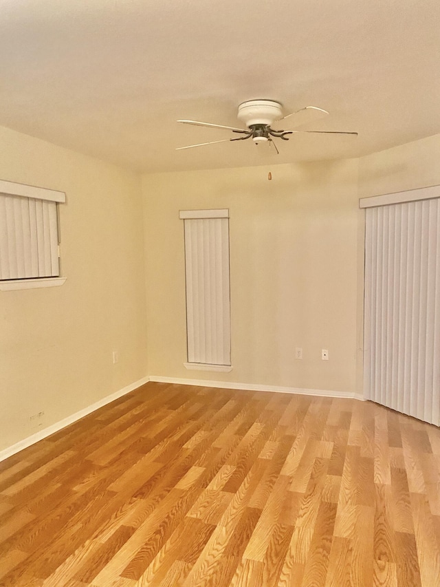 spare room with light wood-type flooring