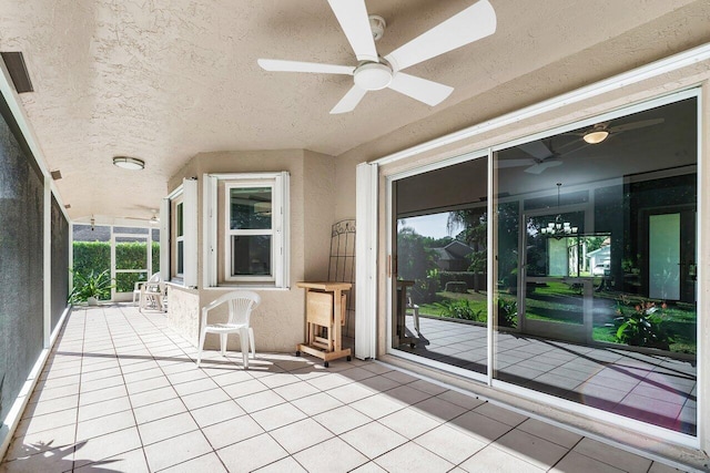 view of patio featuring ceiling fan