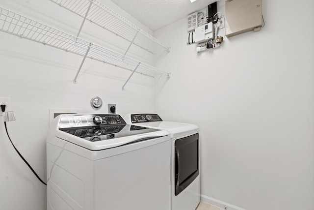 laundry area featuring separate washer and dryer