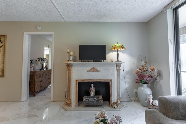 living room featuring a textured ceiling