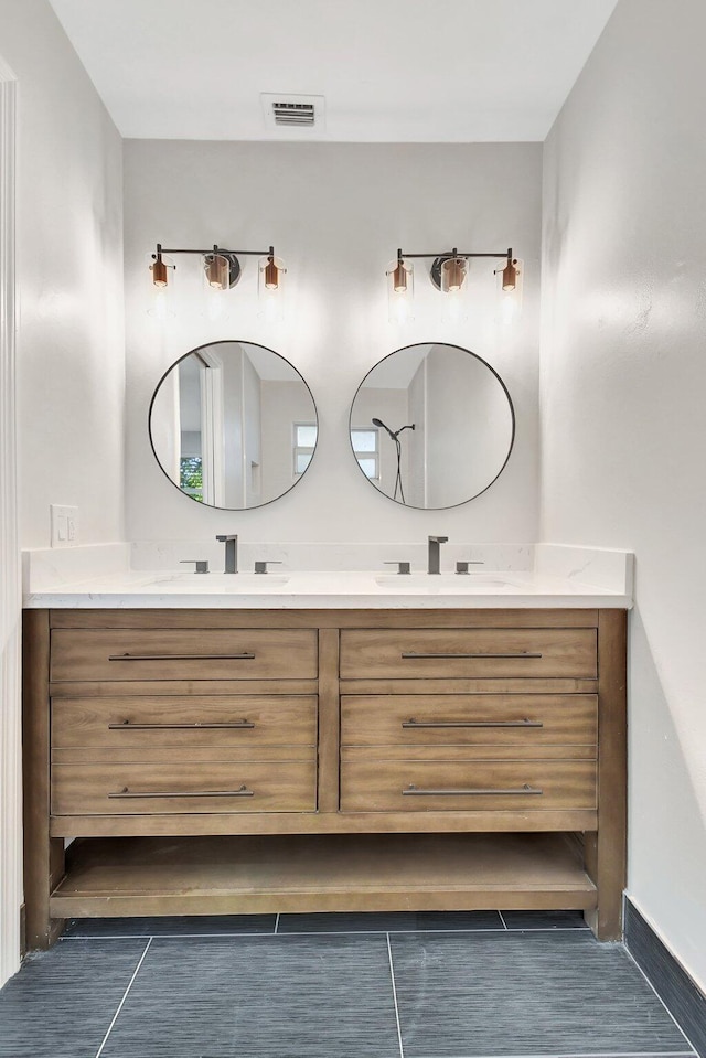 bathroom featuring vanity and tile patterned floors