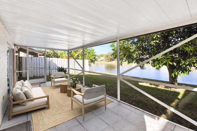 sunroom with a water view