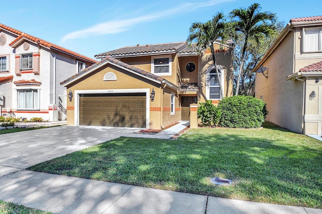 mediterranean / spanish home with a front yard