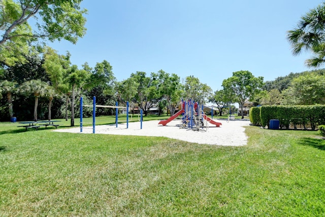 view of jungle gym with a lawn