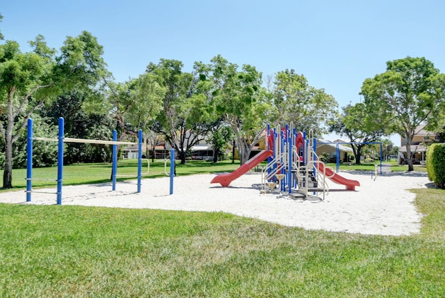 view of jungle gym with a lawn