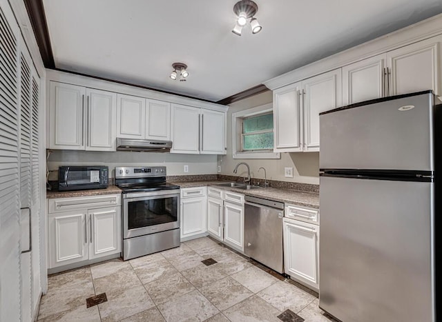 kitchen featuring stainless steel appliances, ornamental molding, white cabinetry, and sink