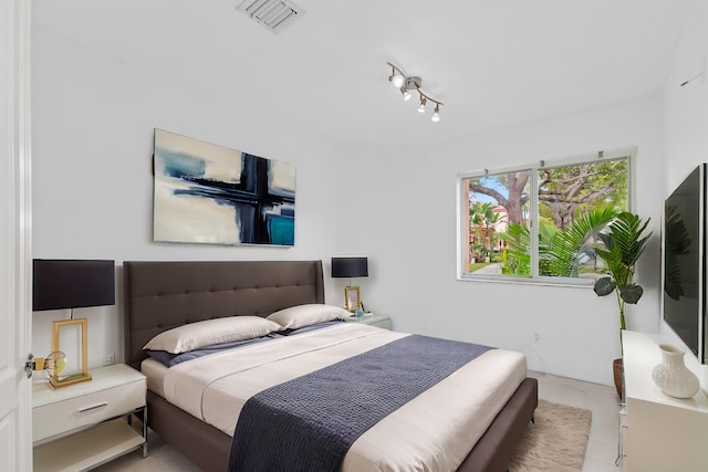 bedroom with track lighting