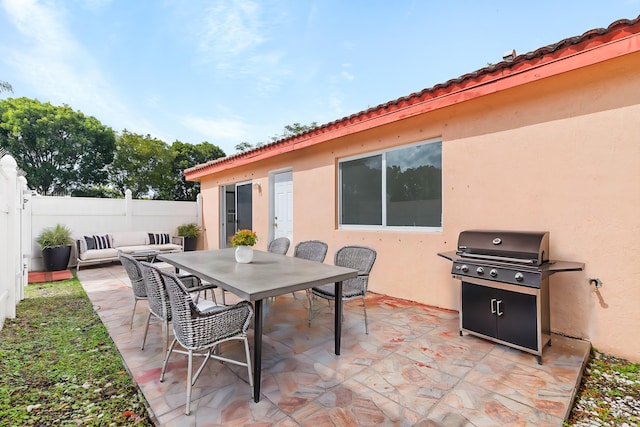 view of patio / terrace featuring outdoor lounge area and area for grilling