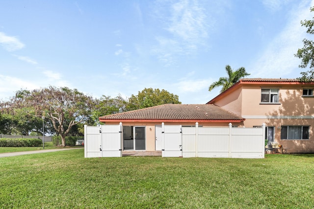 exterior space with a lawn