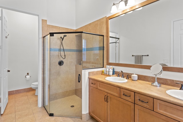 hall featuring light tile patterned floors and sink