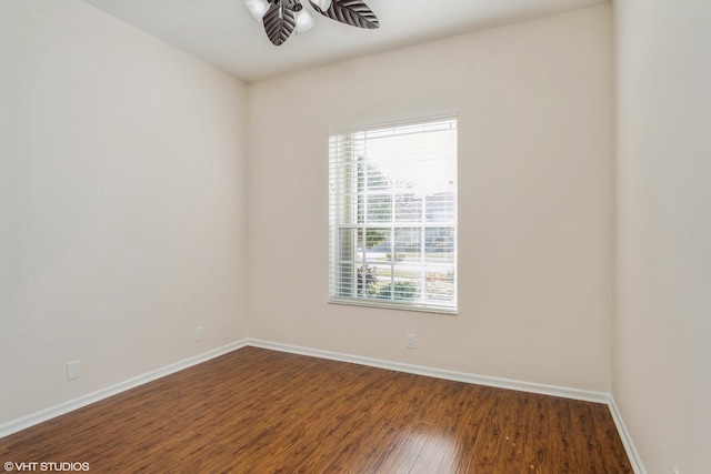 unfurnished room featuring ceiling fan and hardwood / wood-style floors