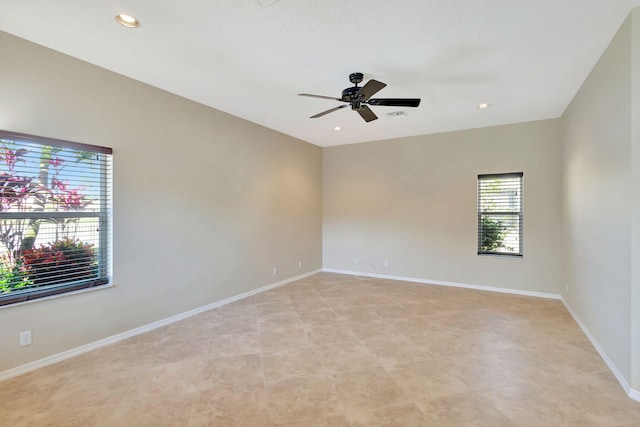 empty room featuring ceiling fan