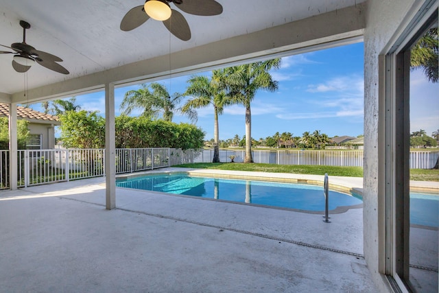 view of pool with ceiling fan and a patio area