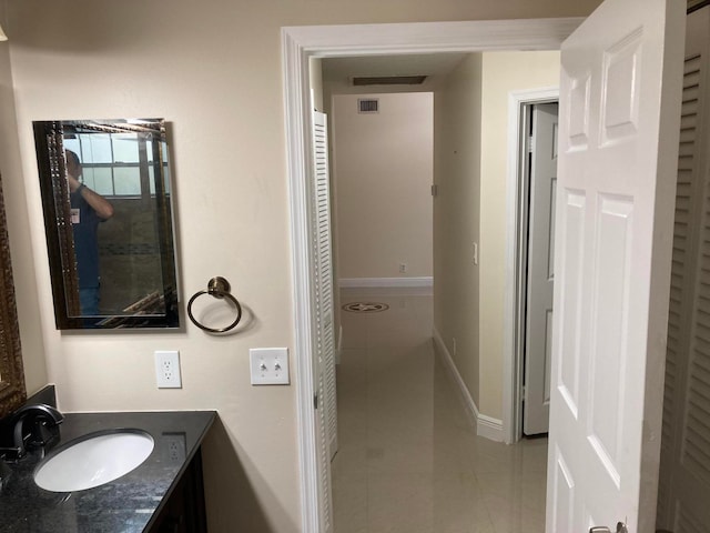 bathroom featuring vanity and tile patterned floors