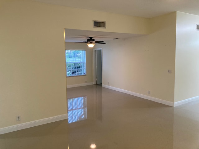 unfurnished room featuring ceiling fan