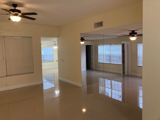 empty room with light tile patterned floors