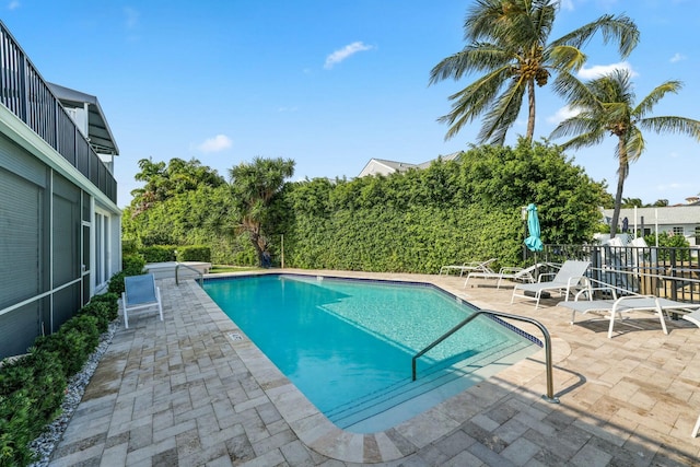 view of pool featuring a patio area