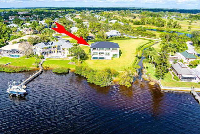 birds eye view of property featuring a water view