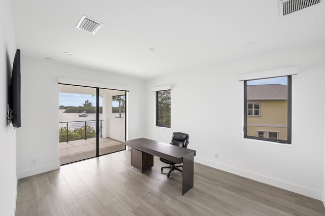 office space featuring light hardwood / wood-style flooring